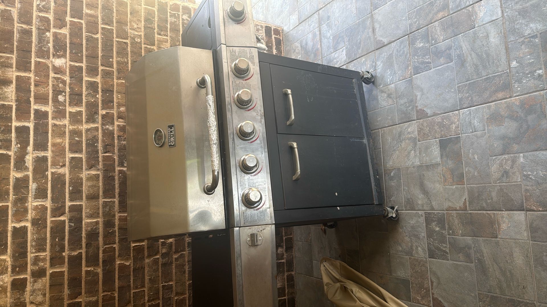 Backyard Grill With 2 Propane Cylinders