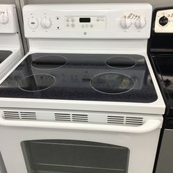 GE 4 Burner Glass Top Range. 1 year Warranty 