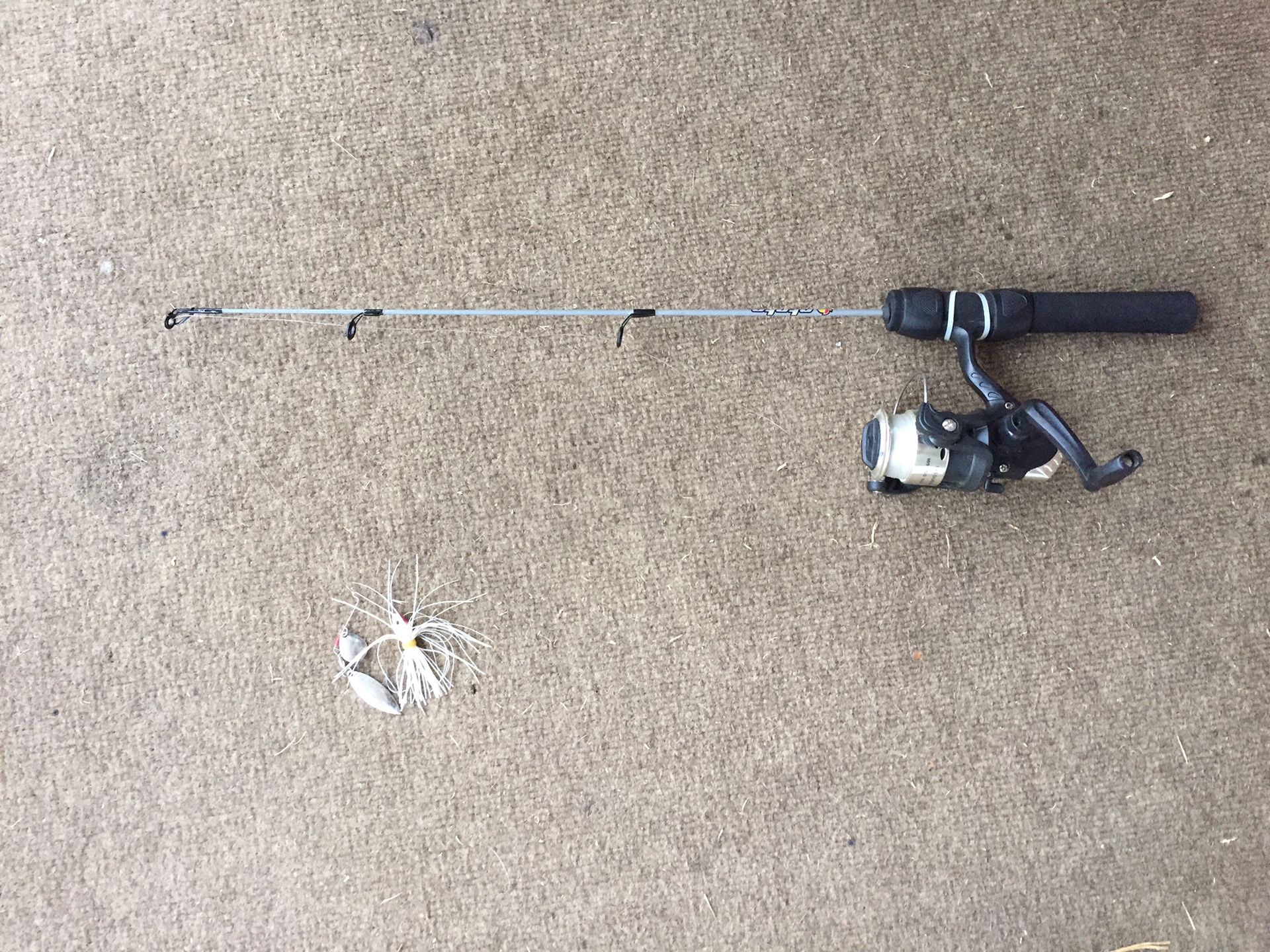Small 2 foot no brand name fishing rod and reel