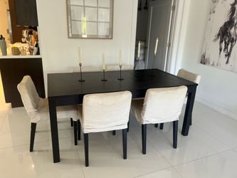 Black table with 6 chairs