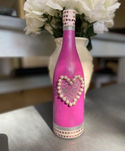 Decorated wine bottle