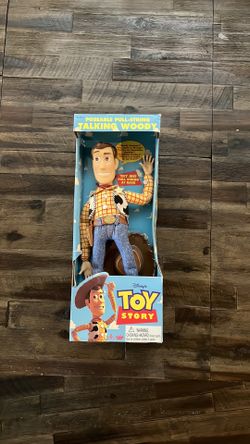 Vintage Poseable Pull String Talking Woody Doll from Toy Story by Thinkway Toys