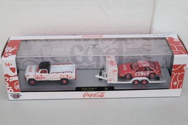 M2 Machines Coca-Cola 1969 Ford F-100 Ranger 4X4 & 1990 Ford Mustang GT. CHASE 1/750