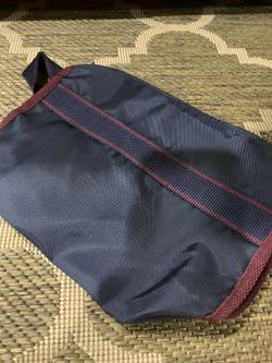 blue and maroon nylon utility pouch.