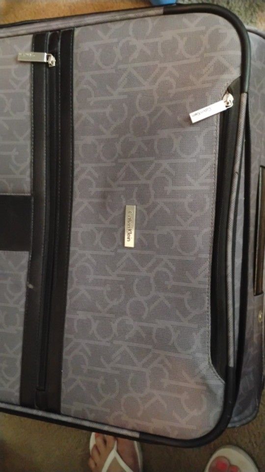 Calvin Klein Rolling Suitcase Like New