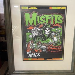 The Attack" design for the legendary horror-punk band, the Misfits. It is one of the band's most recognizable pieces of modern merchandise, framed can