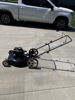 Big rear wheels push lawnmower runs perfect and I accept broken mowers traded in!