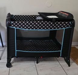 Disney Saftey1st Pack n' Play with changing table and Ikea High Chair
