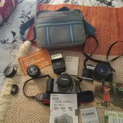 2) Film Type 35mm Cameras And Extras.