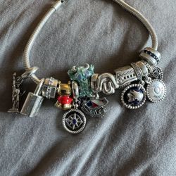 Pandora  Bracelet With 9 Charm’s 