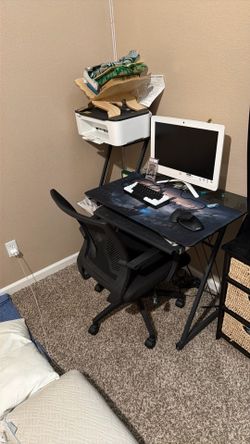 Office desk with 3 storage levels and has a rolling keyboard place.