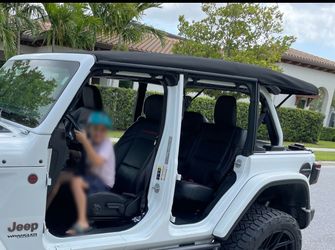 Mopar Soft Top 4 Door Premium Tinted Part Number: (contact info removed)6AB