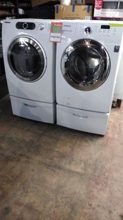 Samsung front load washer and dryer set with pedestal working perfectly with 4 months warranty