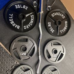 NEW Olympic Equipment Curl Bar of 20# with Cooper Bearings and Plates 2X35s, 2X25s, 2X10s and 2X5s pounds. Brute 170#