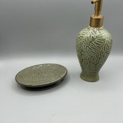 Pretty green ceramic ginkgo leaf soap dispenser and matching soap dish.