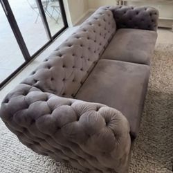 Grey velvet sofa