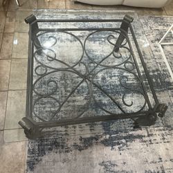 Glass table with black metal legs OBO