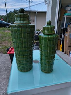 Pair of green ceramic jars