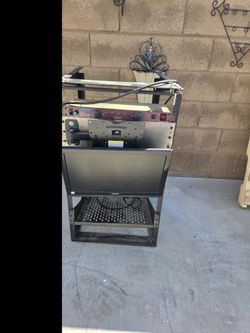 Stand with TV attached and works FREE