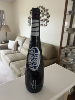 Coors  light Bat Shaped collectible Amber bottle. 