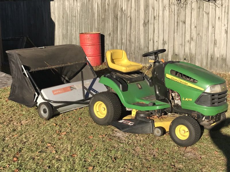 John Deere LA115 lawn tractor and 50 inch lawn sweeper