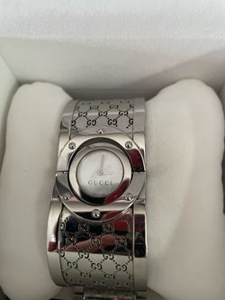 Hardly used authentic Gucci watch with 2-sided face