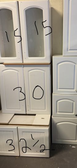 Five White Upper Kitchen Cabinets