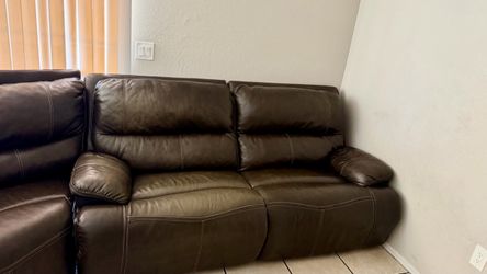 Black leather reclining sectional