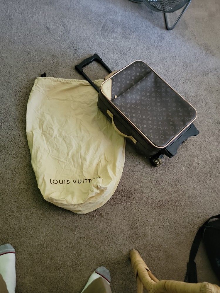 Louie Vuitton Rolling Bag.