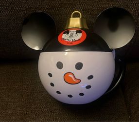 This is a Disney Parks Mickey Mouse Club Snowman Ornament Drink Holder or Mug Mew