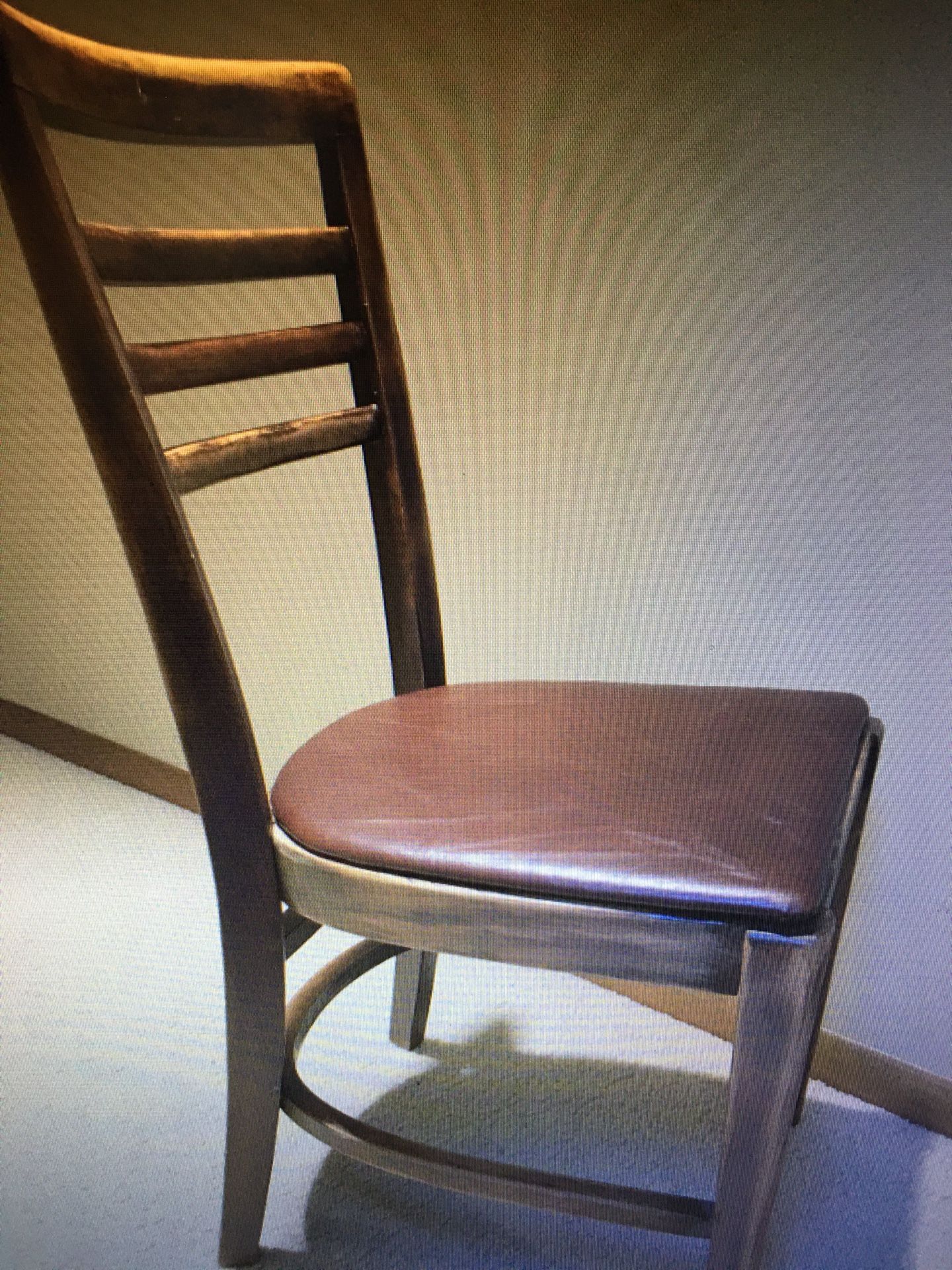 Vintage chair with leather seat cushion