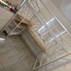 Twin loft bed with L shaped desk and charging system 