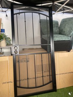 36 in. x 80 in.  Black Defender Security Door