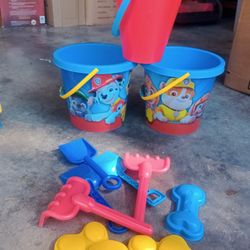 Paw Patrol Sandbox Kit With Shovels And Other Things To Go With It. 