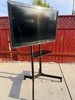 Sharp AQUOS LC-46LE62UT 46" LED LCD TV With Tv mount on wheels
