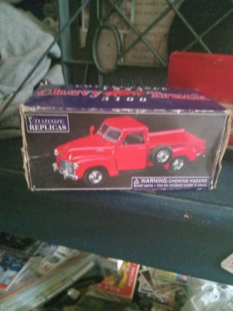 Die cast 53 Chevy truck.