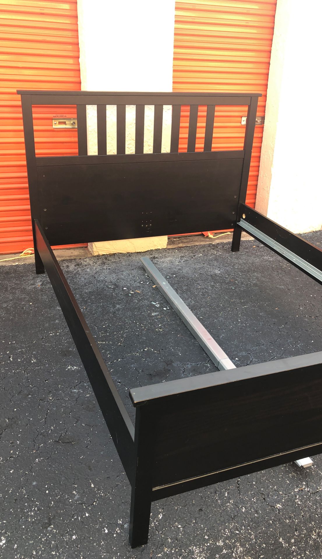 Great condition Queen size Dark wooded bed frame w/ Queen size Sealy mattress and box springs. $190 or best offer. Must be gone today and pick up rea