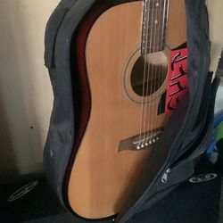 Acoustic guitar w/ case new strings