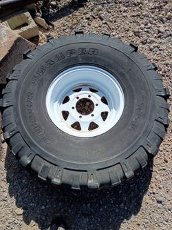 TSL Super Swamper 38x12.50-15LT Mud Tire on Wheel
