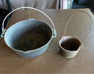 Two cast iron pots