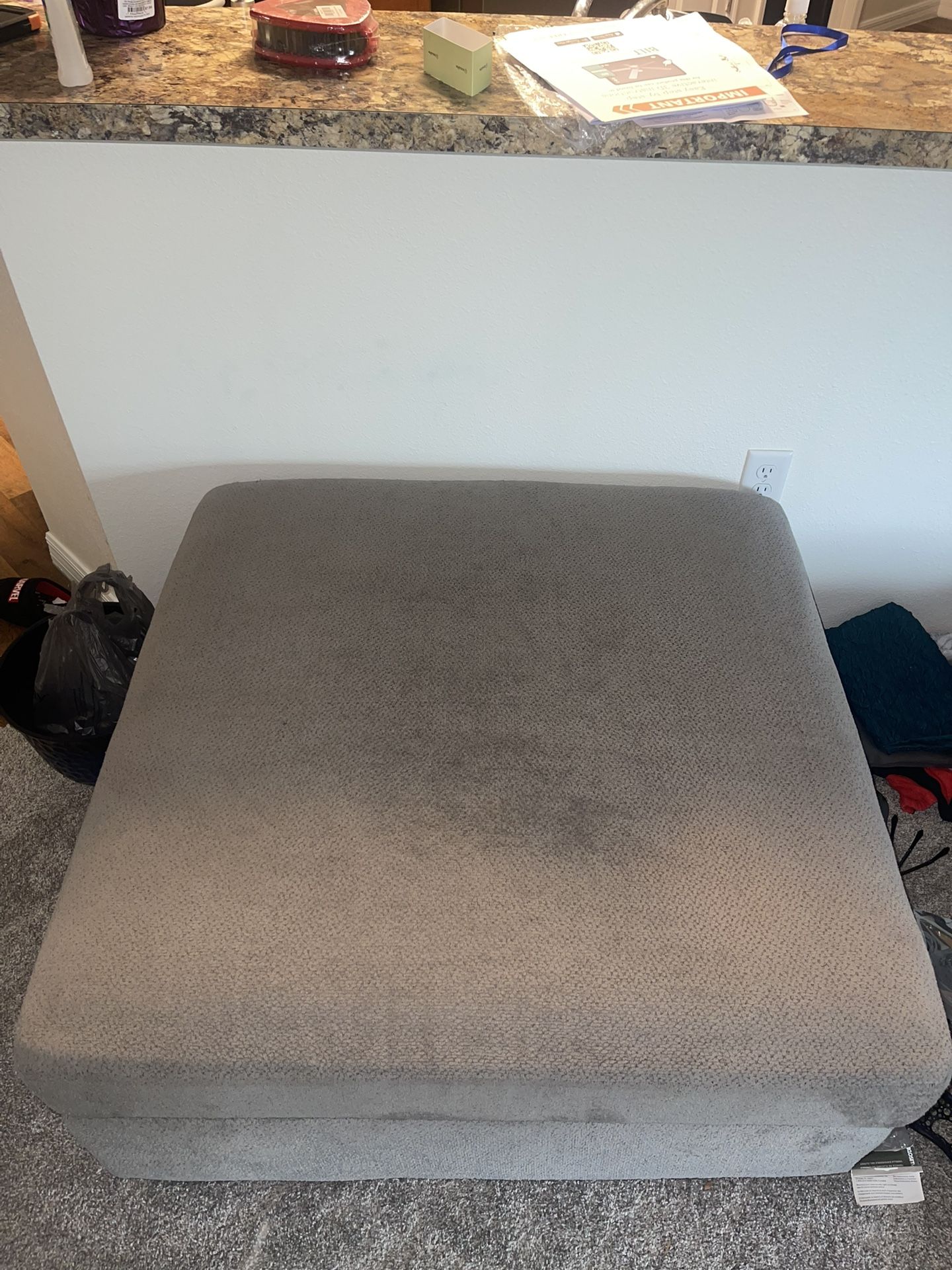 Gray ottoman with storage