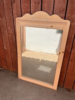 Mirror with wooden frame