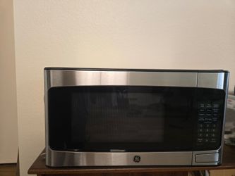 GE MICROWAVE OVEN new