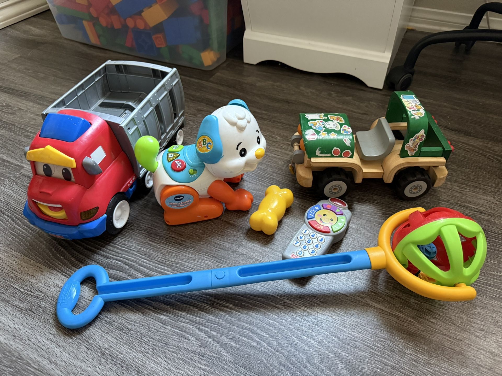Random baby toys, the red car moving face and etc $20 for all