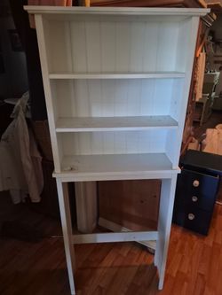 Over toilet shelving unit $5