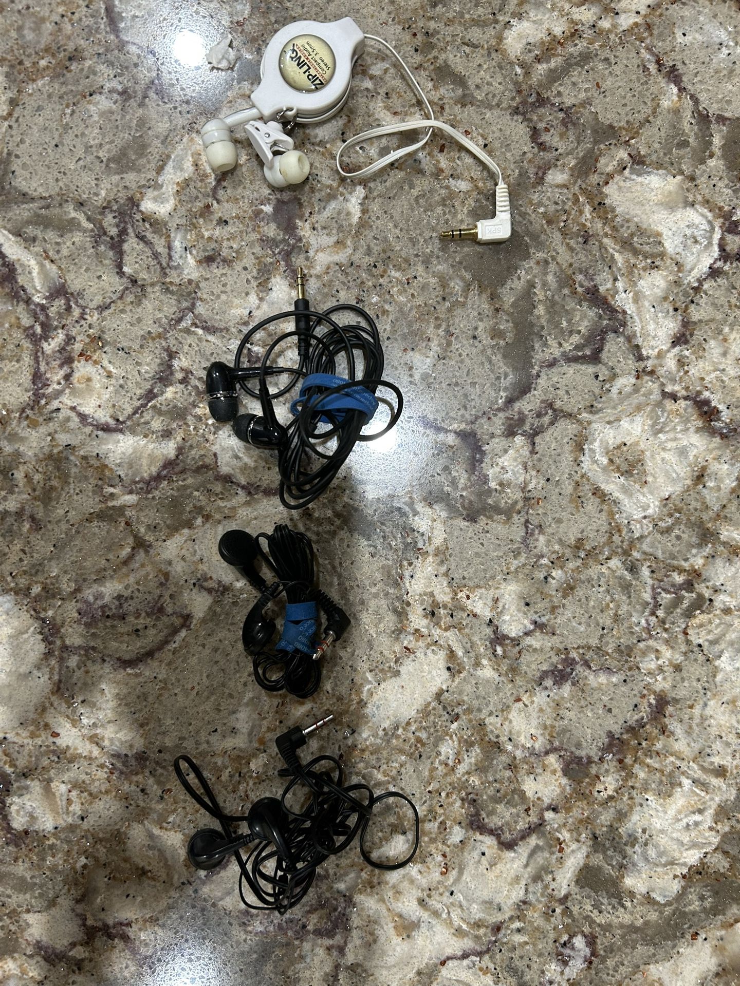 4 Sets Of Never- Used Earphones