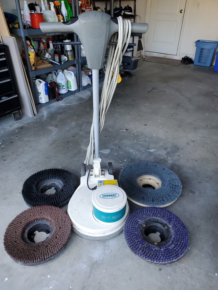 Tenant 17  Inch Floor Scrubber,  4 pad Holders for Multiple Surfaces   Good Condition $250.00.      Obo