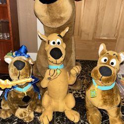 4 Different Sized Scooby Doo Plushies 