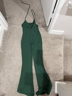 One Piece Jumper Stretches Size Medium Will Fit a Someone That’s A Large Or Xl