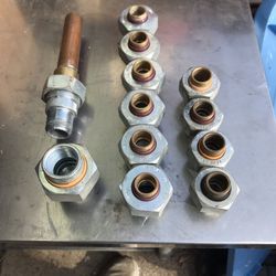 Galvanized dielectric unions galvanized to copper